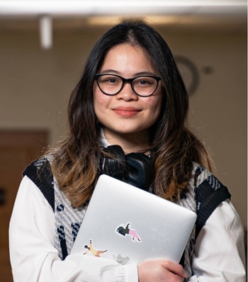 Success story Ngan Nguyen smiling.