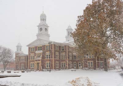 Exterior of Old Main While Snowing.