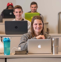 Students Smiling in a Classroom.