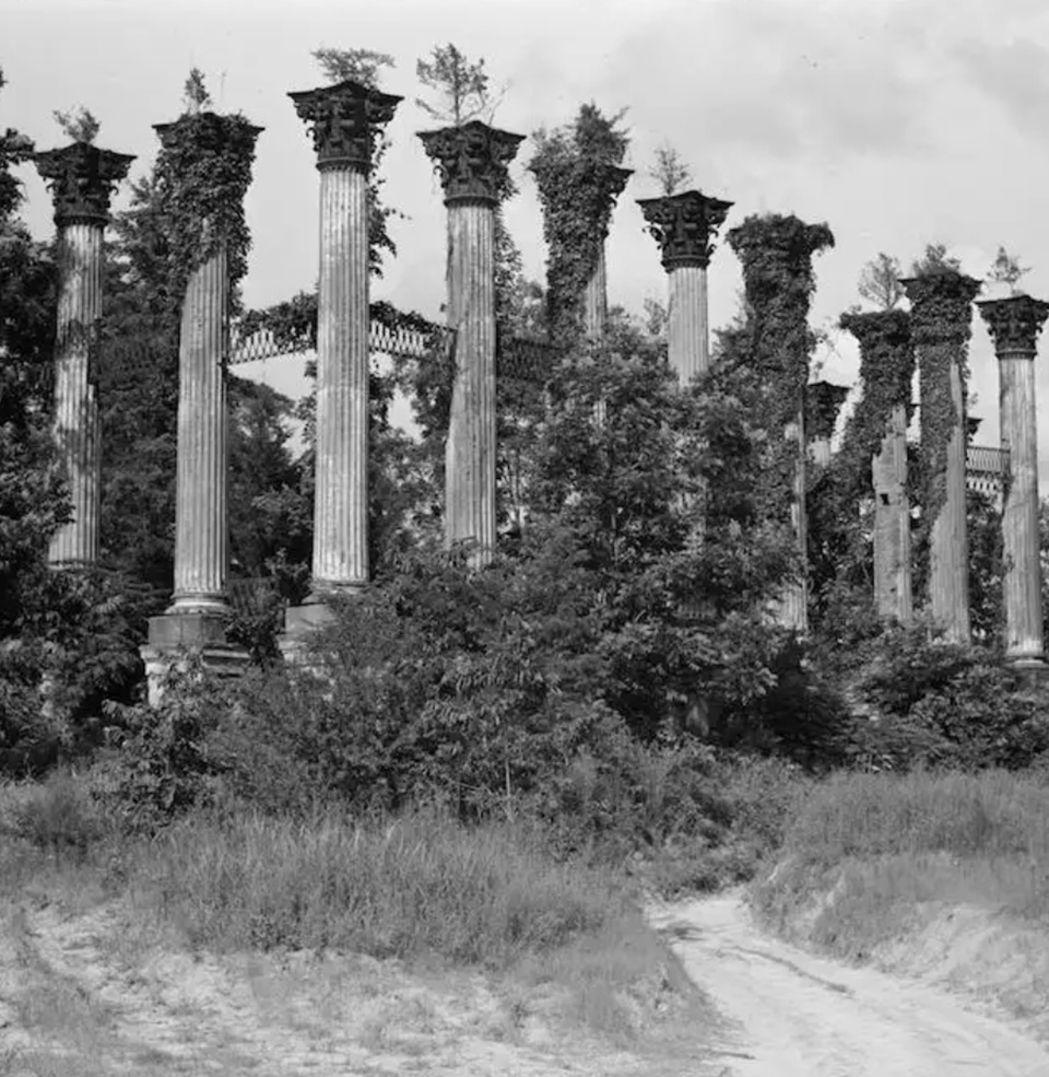 A digitized photo of an old southern building with pillars
