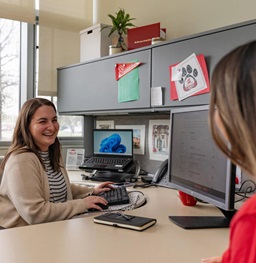 A Beacom Student Success Center advisor meeting with a student at their office.