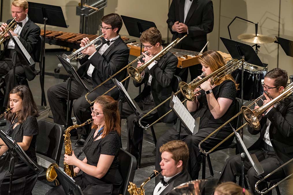 Students playing instruments in a band.