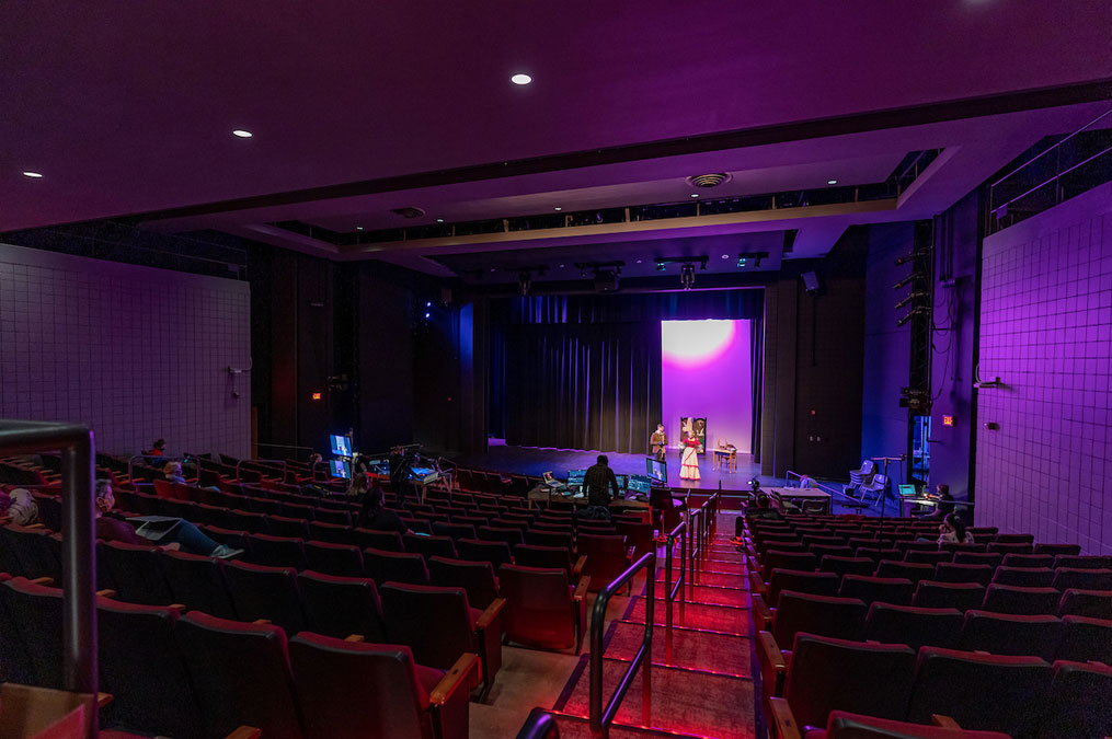 Modern theatre production hall with purple lighting