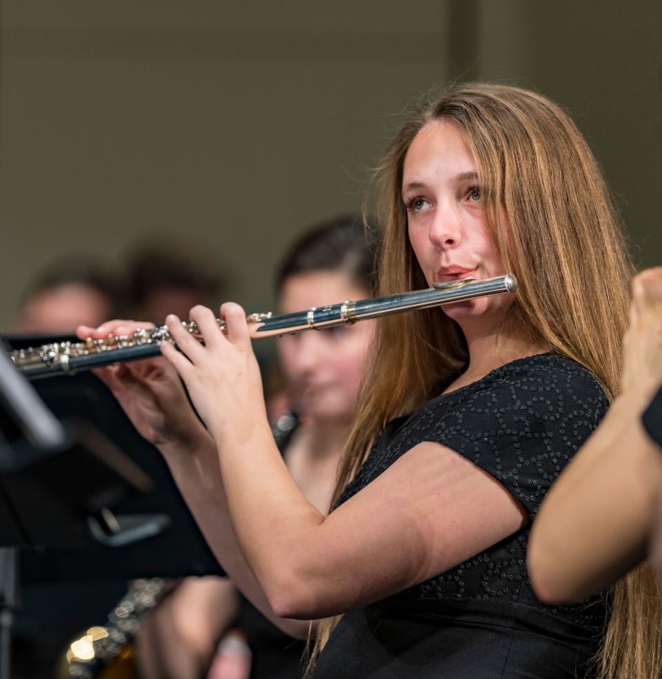 The USD Symphonic Orchestra playing on stage.