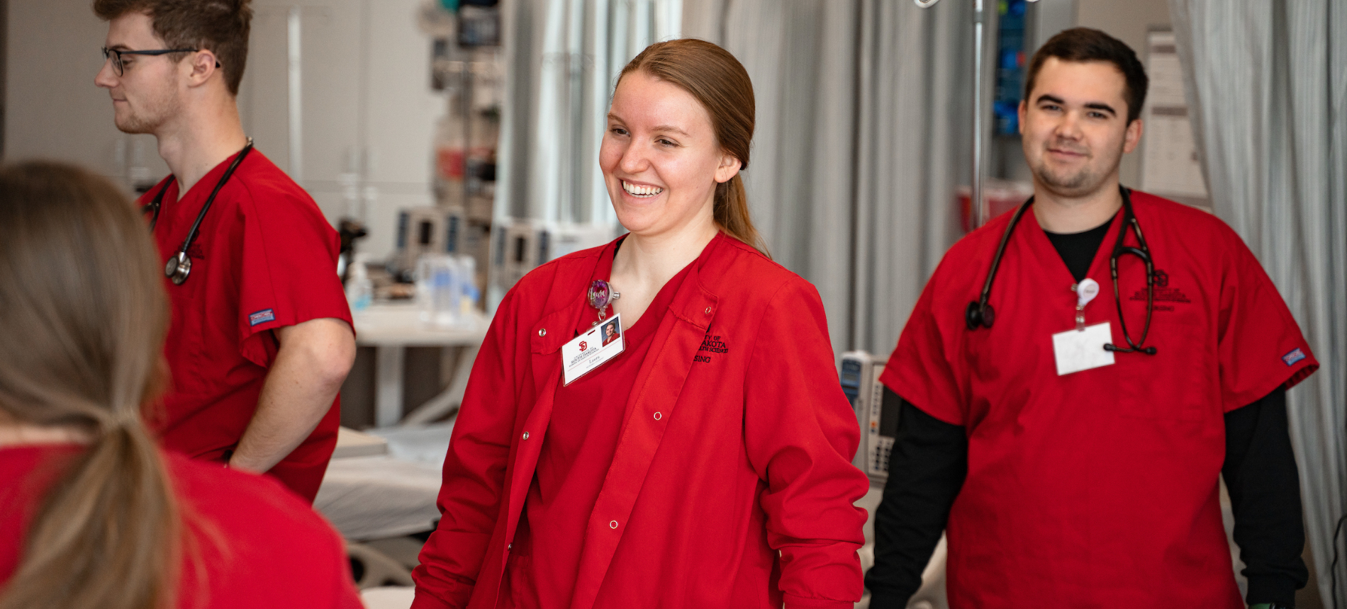 Simulation lab students working on test programs.