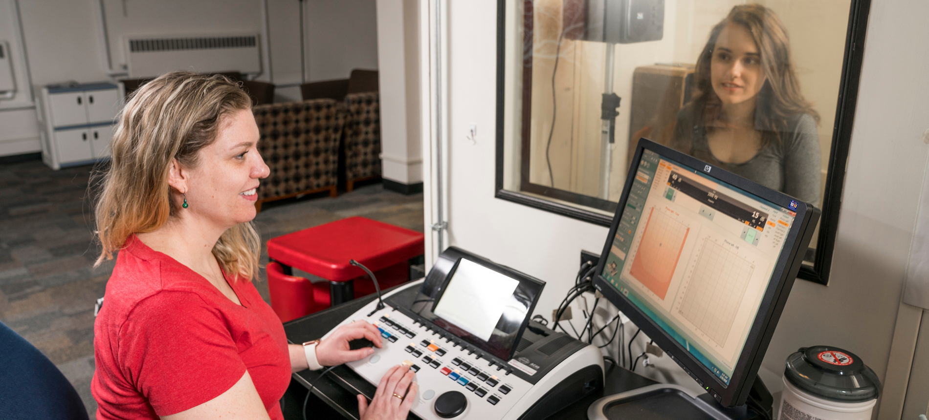 Doctor of Audiology student working with a subject