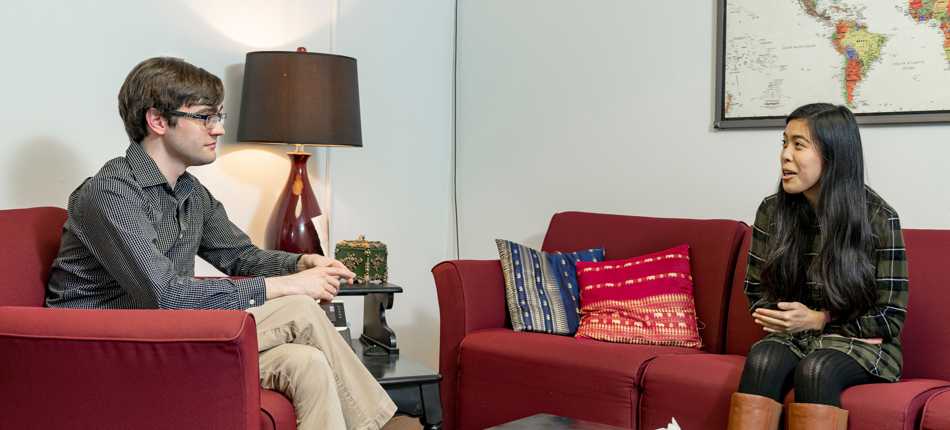 Two Psychology students talk in a study lounge 