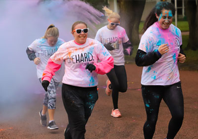 Students participate in the annual Dye Hard Color Run at USD.