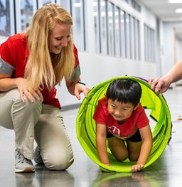 Student Gaining Hands-On Experience Working With a Patient Inside a Clinic.