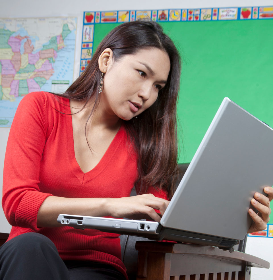 Female looking at a laptop