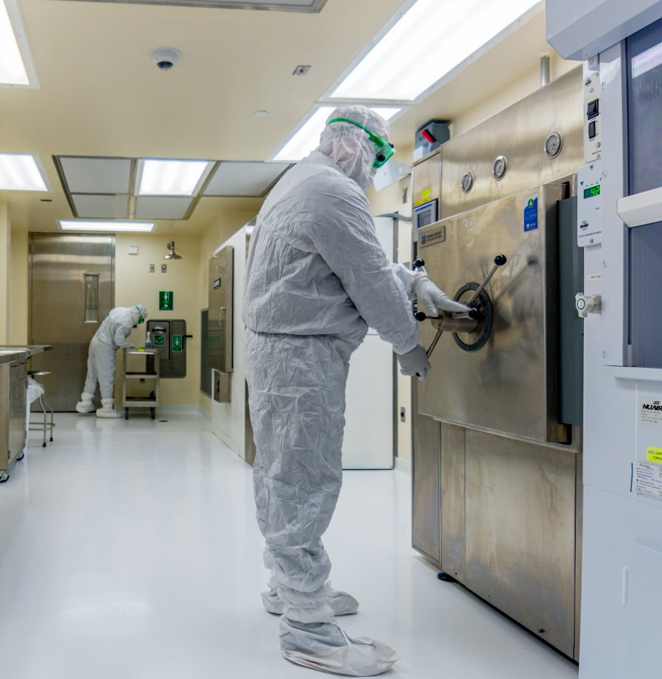 Two Students Working in the cGMP Cleanroom.
