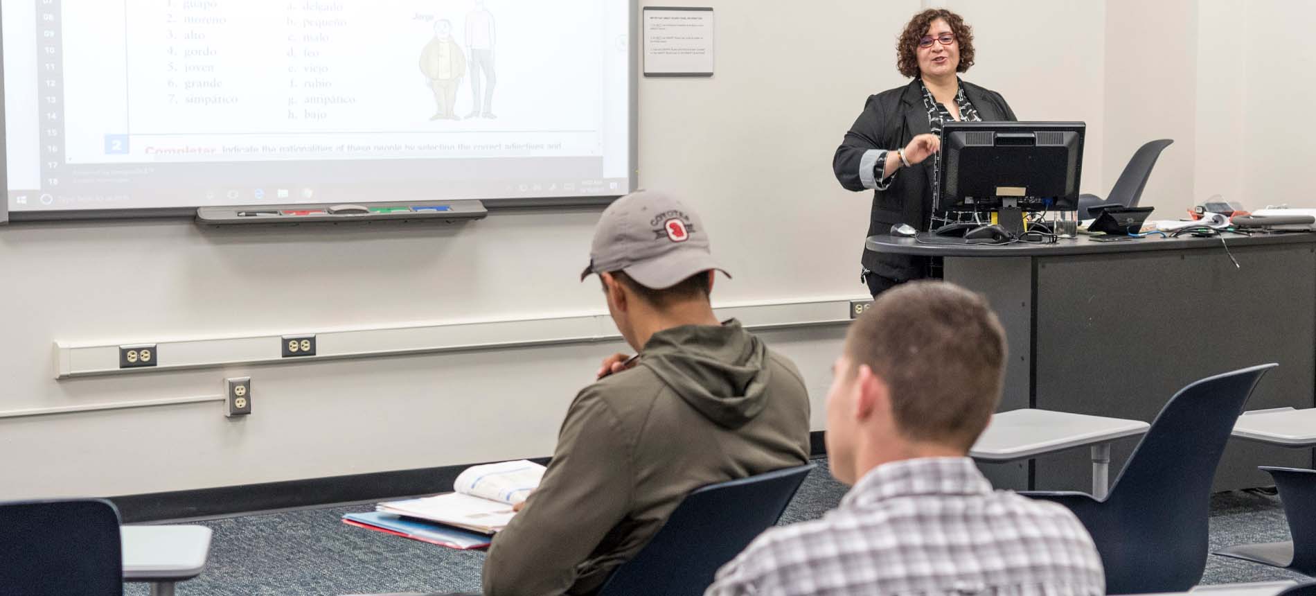 Spanish Professor Lecturing to a Class