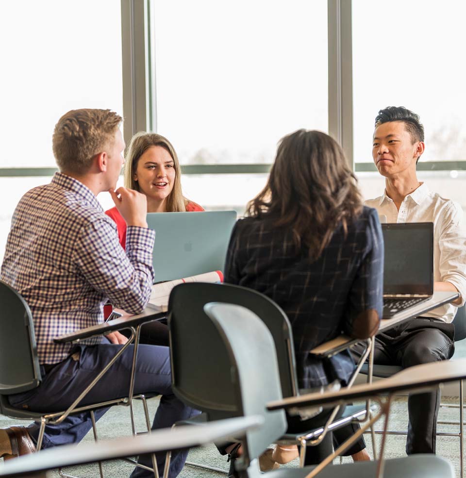 Group of Accounting Students Sitting at a Table.