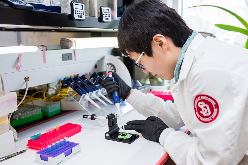 Biomedical Student works in the lab in the Gear Center in Sioux Falls, SD