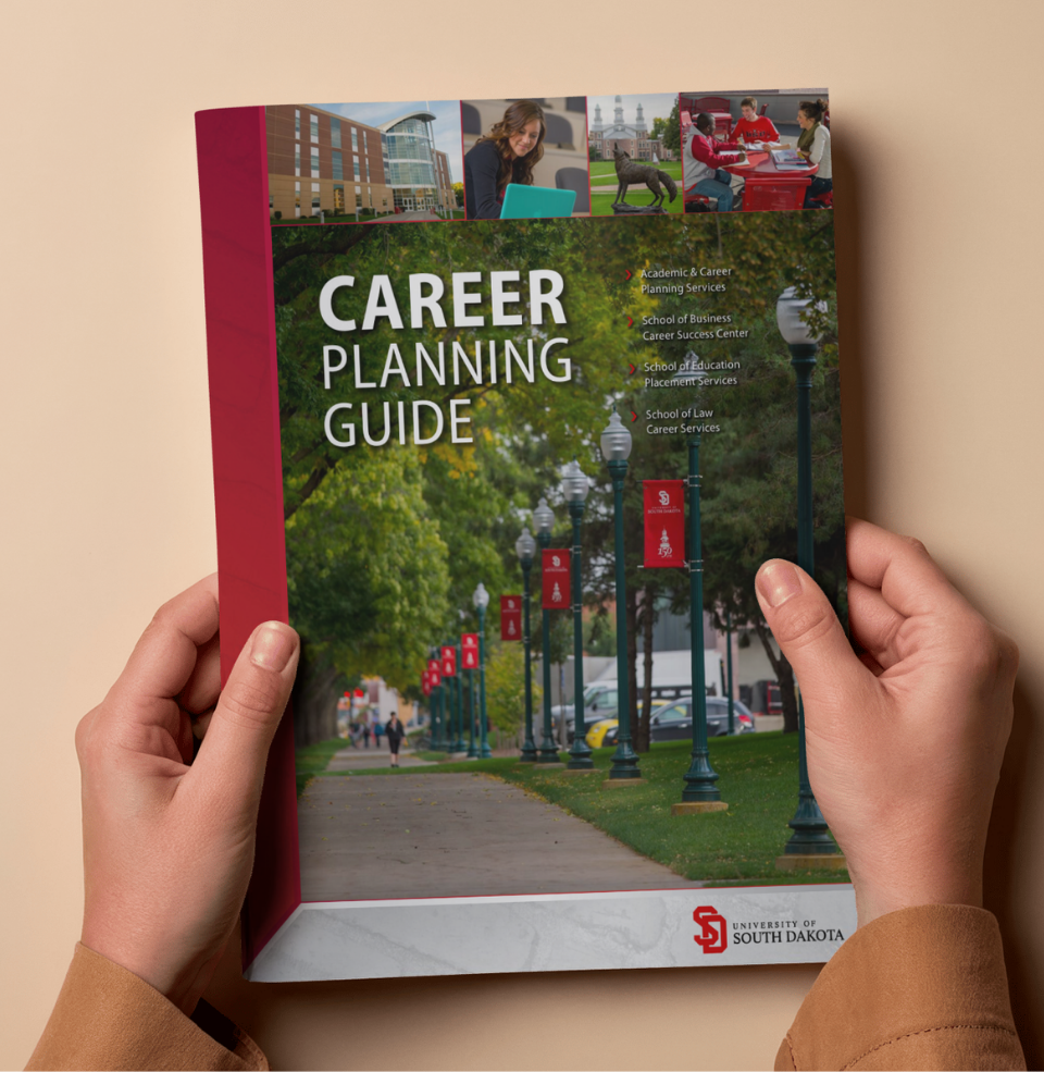 a photo of the career planning guide in somebodies hand