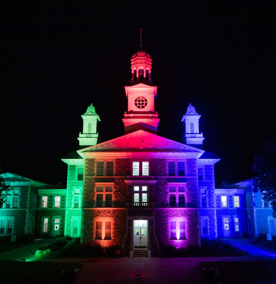 Old Main light up colorfully during the holidays.