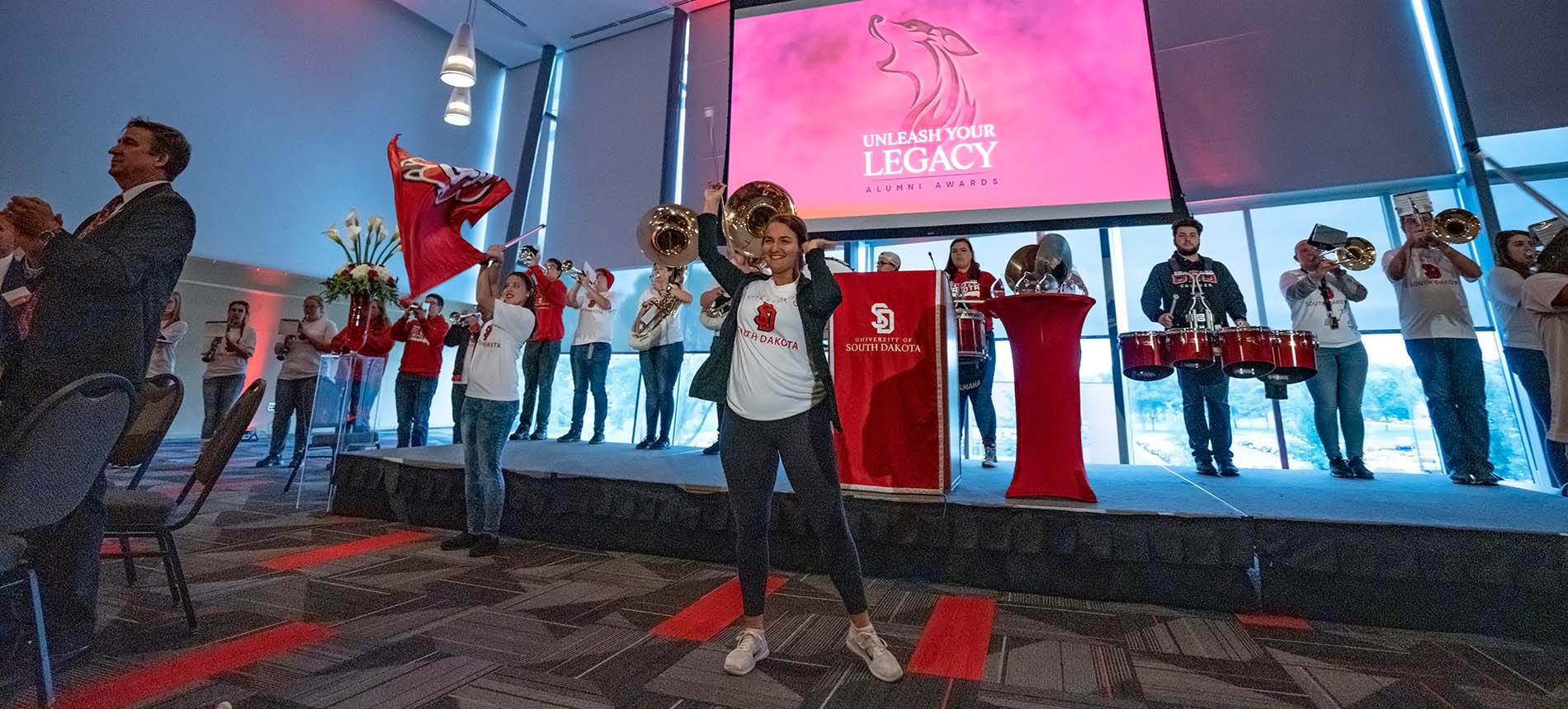 Students presenting at the alumni Unleash Your Legacy event.
