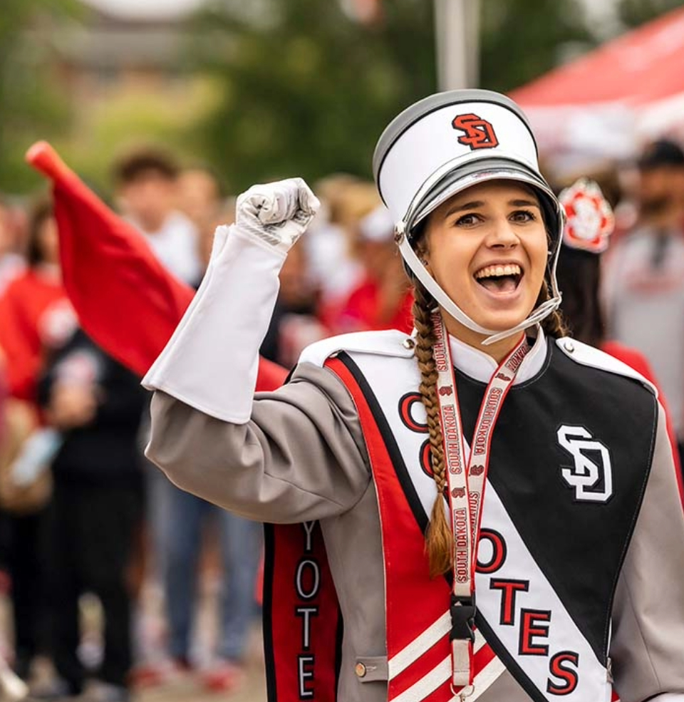 The Sound of USD Band chief smiling during the Dakota Days parade.