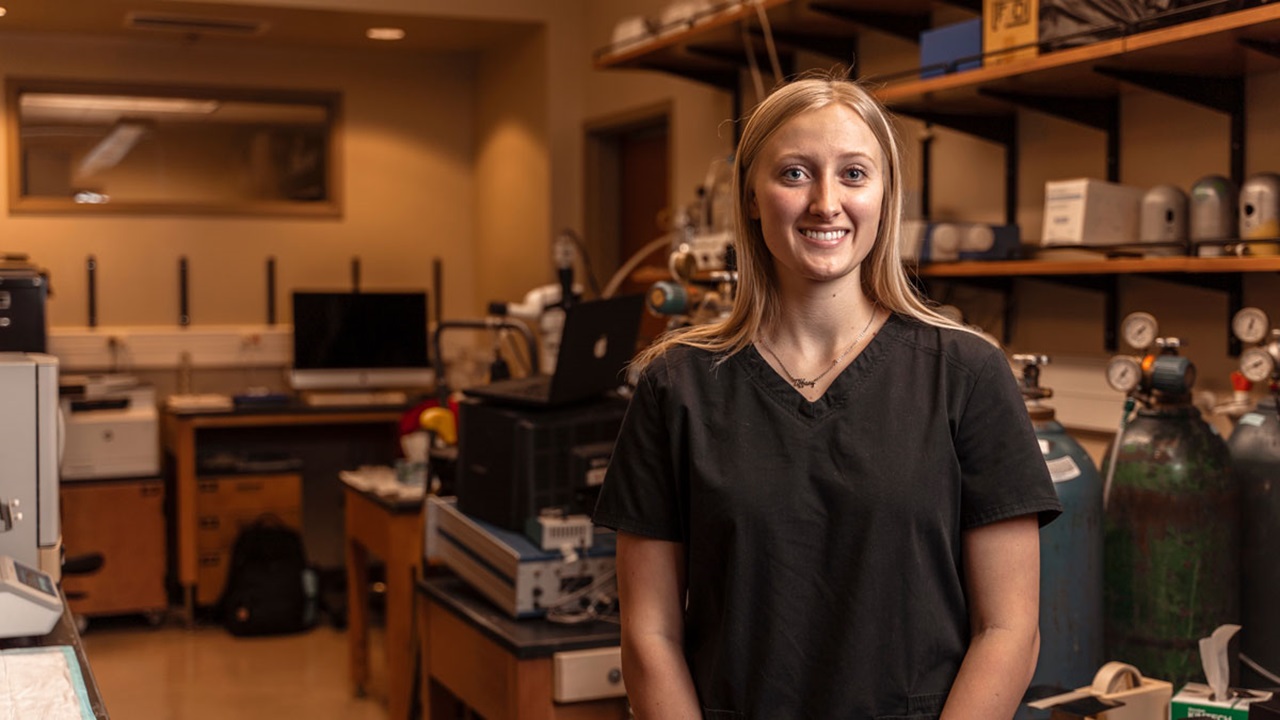Portrait of Tiffany Knecht in a science lab.