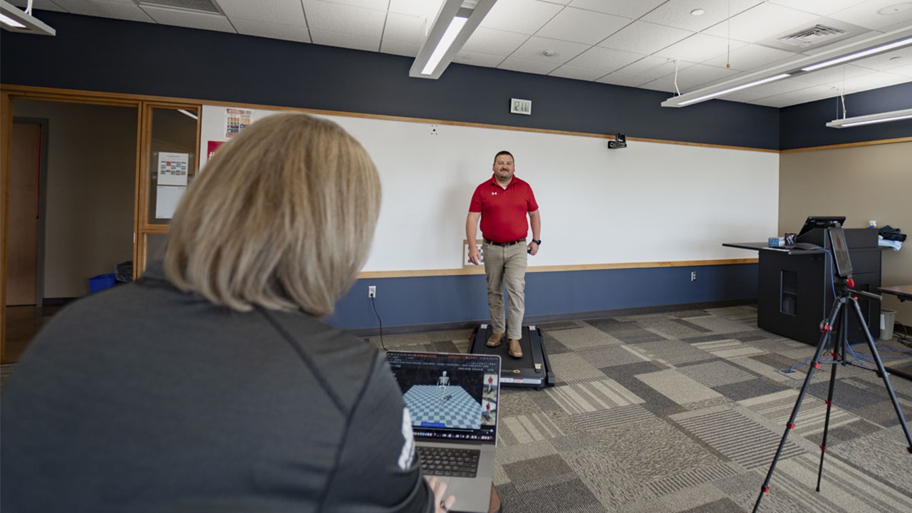 Lisa MacFadden records a student walking on the treadmill to study the mechanics of human movement Lisa MacFadden records a student walking on the treadmill to study the mechanics of human movement