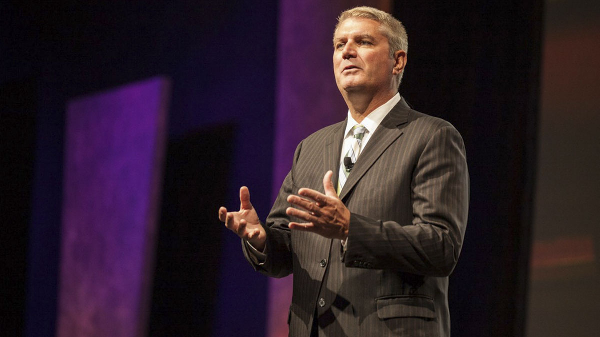 Michael Abrashoff speaking on stage