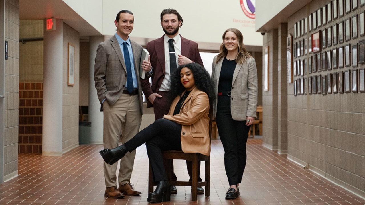 2023 Next Gen Law students posing in law school hallway