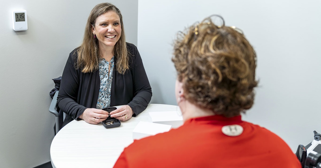 Lindsey Jorgenson talks to a patient at the USD Speech, Language and Hearing Clinic. Lindsey Jorgenson talks to a patient at the USD Speech, Language and Hearing Clinic.