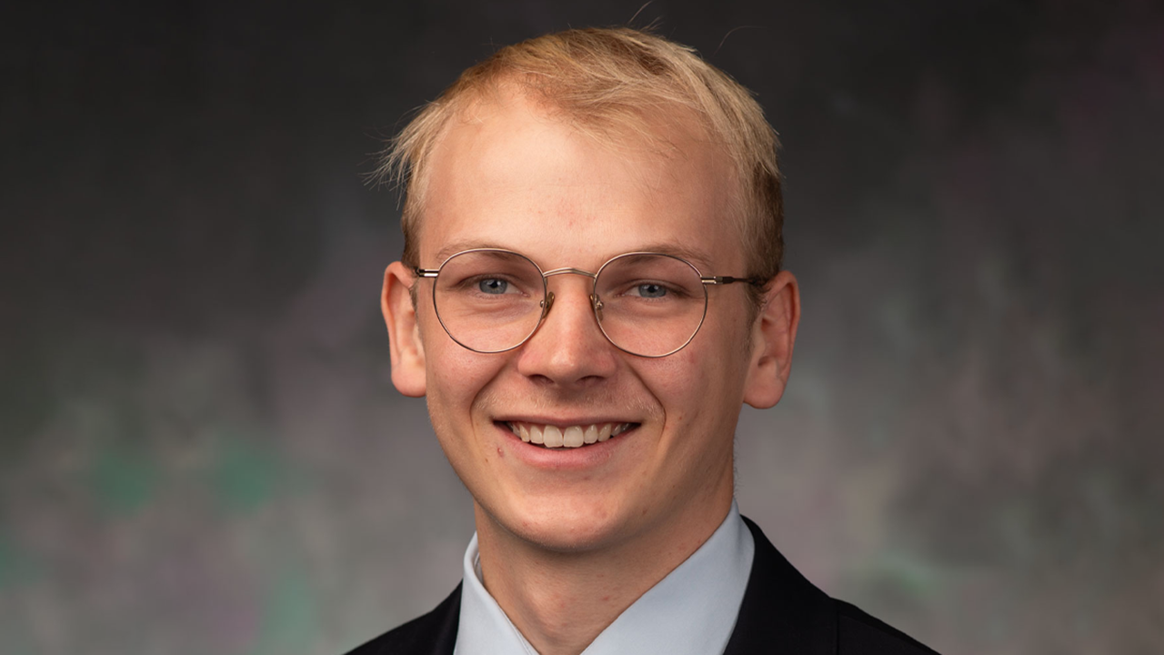 A headshot of Andrew Guymon.