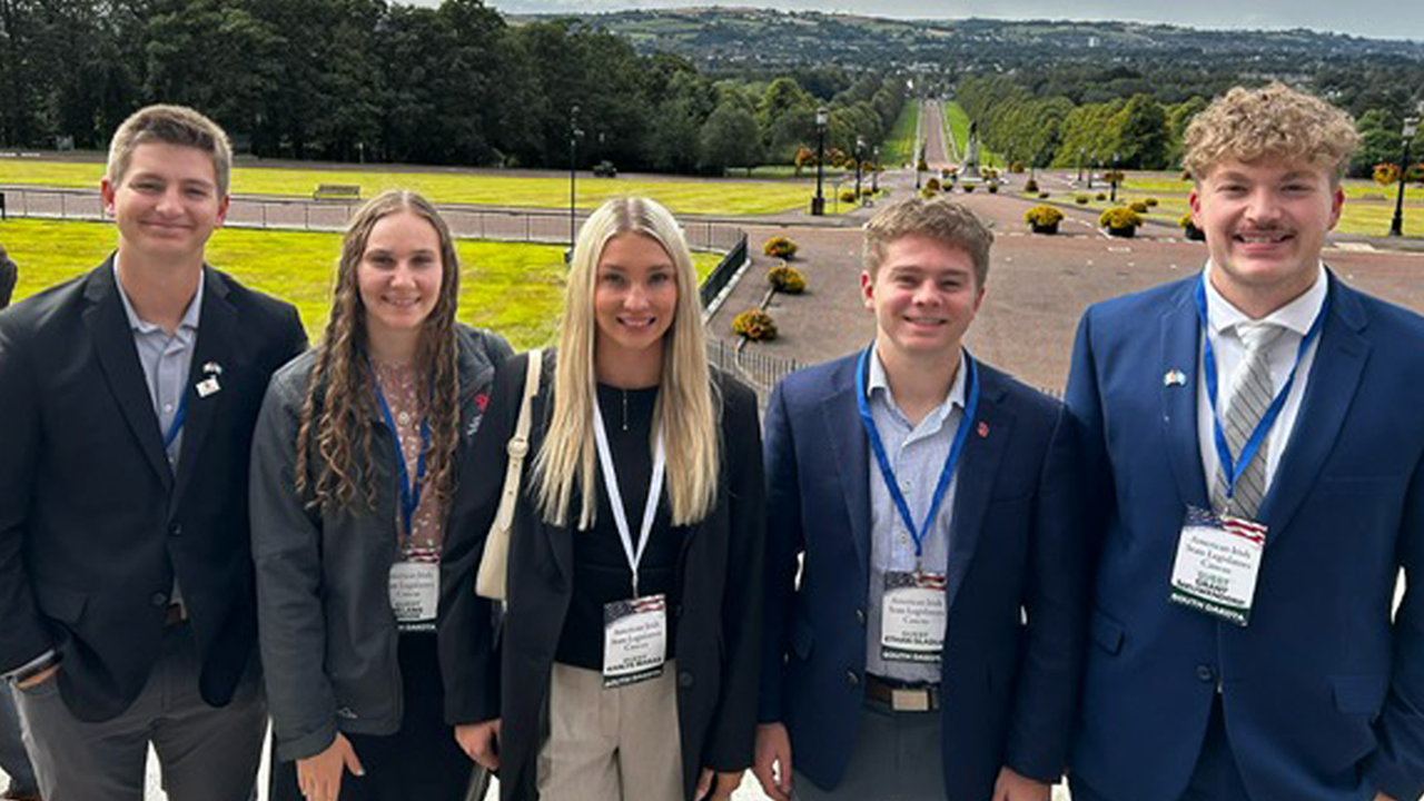 Five USD Beacom School of Business students stand in Ireland, attending the American Irish State Legislators Caucus Summit.