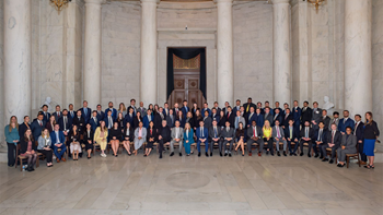 Tory Shafer, J.D., a 2025 USD Knudson School of Law graduate, sits with the Originalism Summer Seminar at Georgetown University’s Center for the Constitution for a group photo.