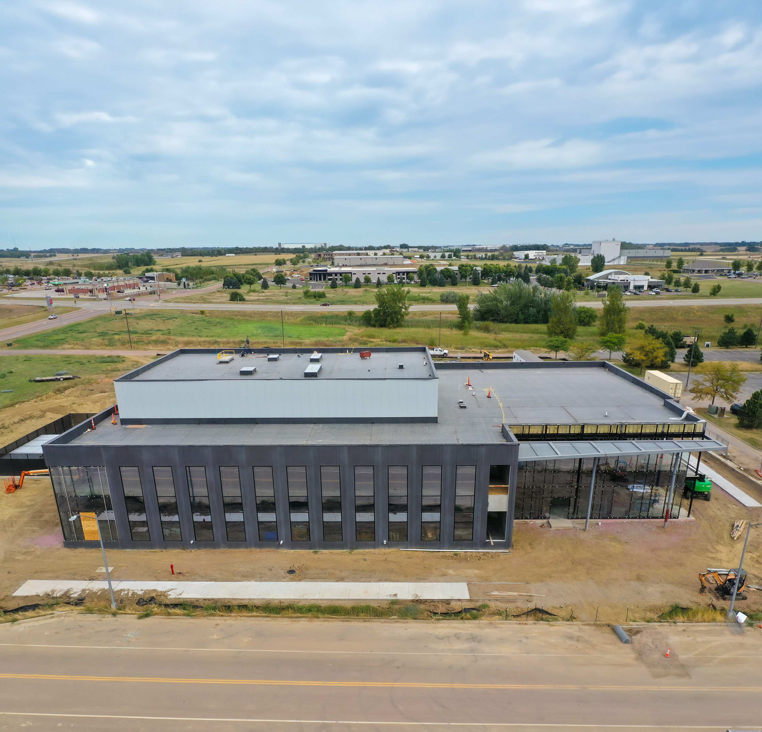 A photo of the exterior of the USD Discovery District against a beautiful blue sky.