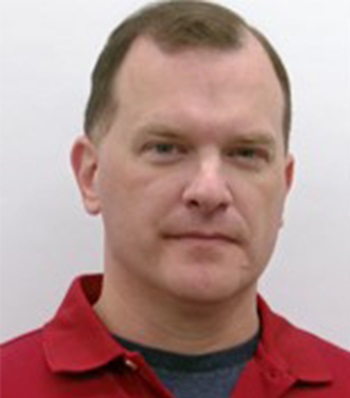 Christopher Struk smiling.