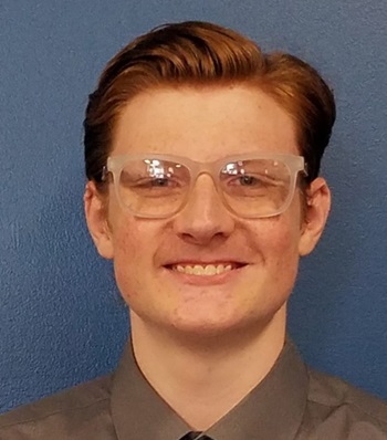 Success story Cody Dias smiling.