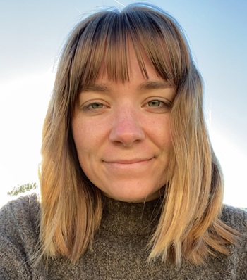 Success story Dakota Wilson smiling.