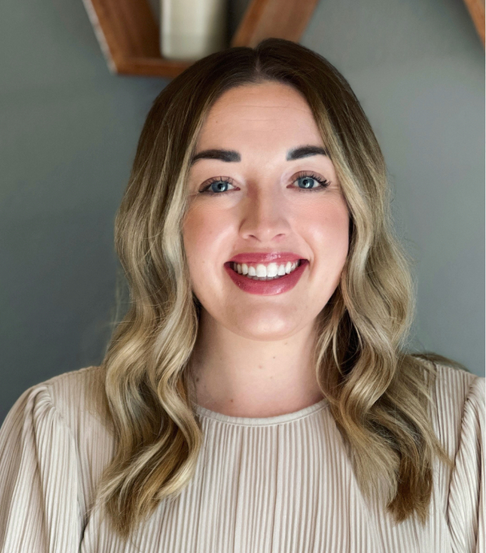 Emily Paris smiling.