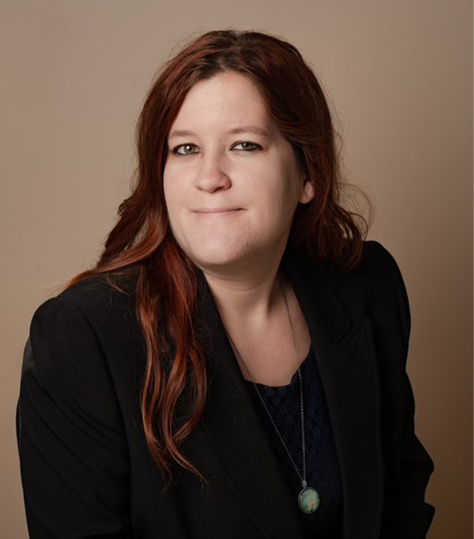 Success story Katherine Kemp smiling.