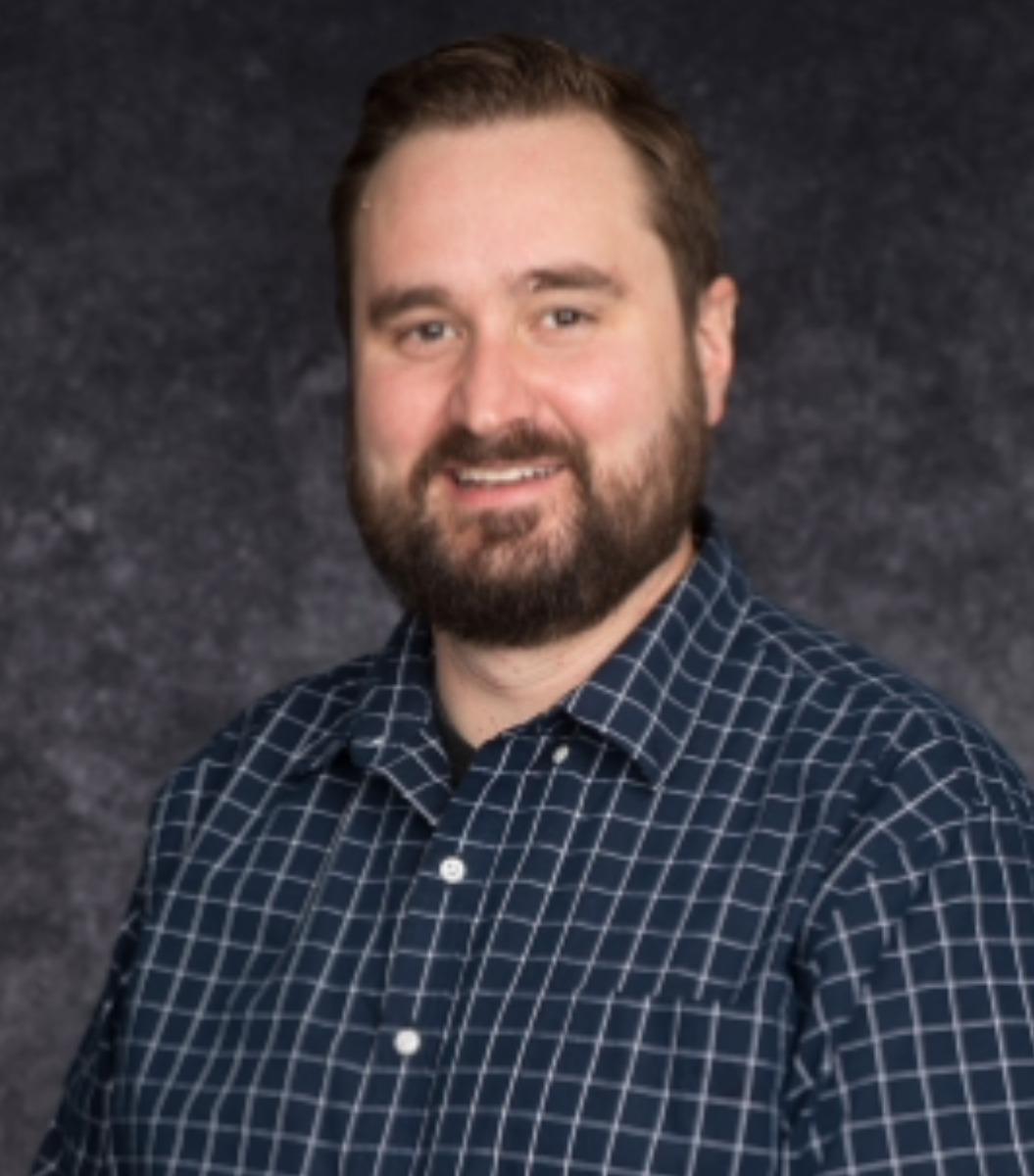 Success story Kyle Laughlin smiling.