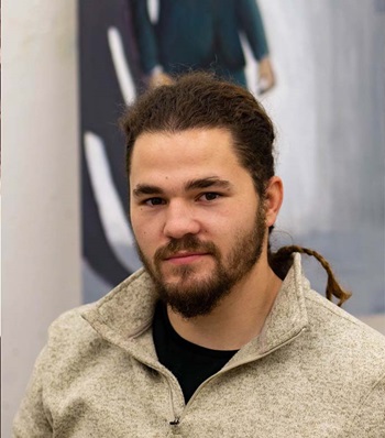 Success story Levi Sternberg smiling.