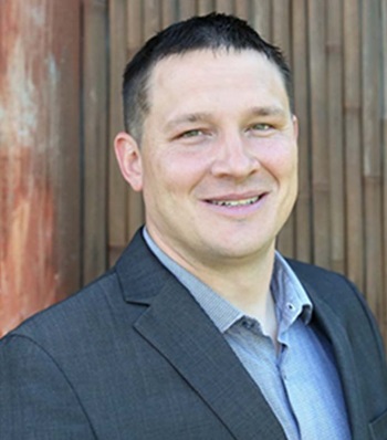 Success story Rocky Welker smiling.