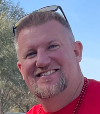 Success story Shane Bork smiling.