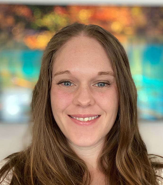 Success story Stephanie Jensen smiling.