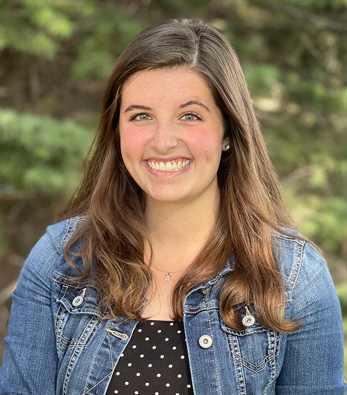 Success story Talia DeWitte smiling.