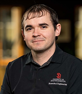 Success story Tim Hartman smiling.