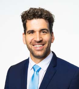 Frank Leibfarth looks at the camera, smiling, for his professional picture.