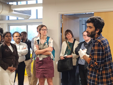 Participants listen as details of AI-integrated materials science are discussed.