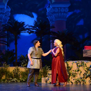 Lauren Paul, on stage with a costar in an opera production.