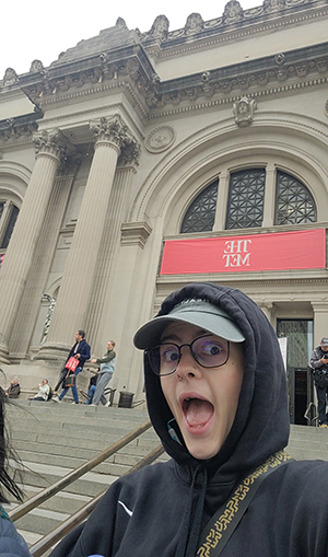 Nathan Valentine, USD art student, takes a picture outside of the MET in NYC.