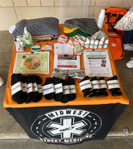 A table of Midwest Street Medical Program's materials and information.