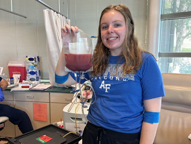 Ashley Miedema smiles at the stem cell donation center.