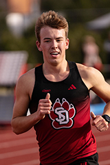 Luke Olson in a track and field event.